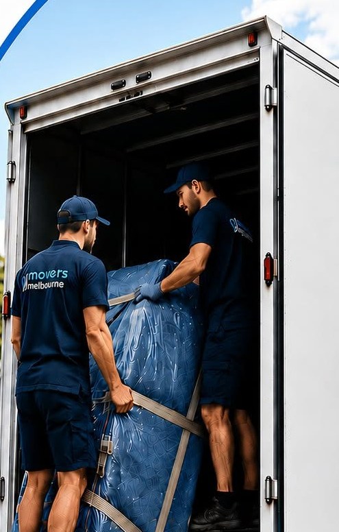 Movers4Melbourne team loading wrapped furniture into a truck